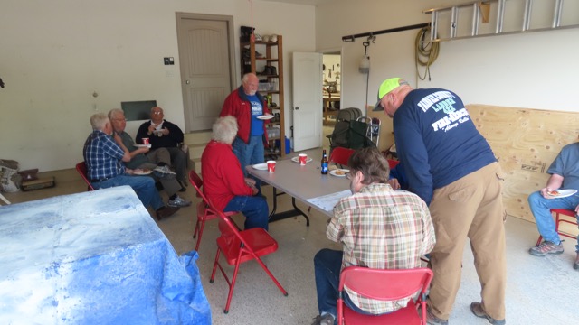 Mike Murphy brought pizzas and drinks to fortify the crew